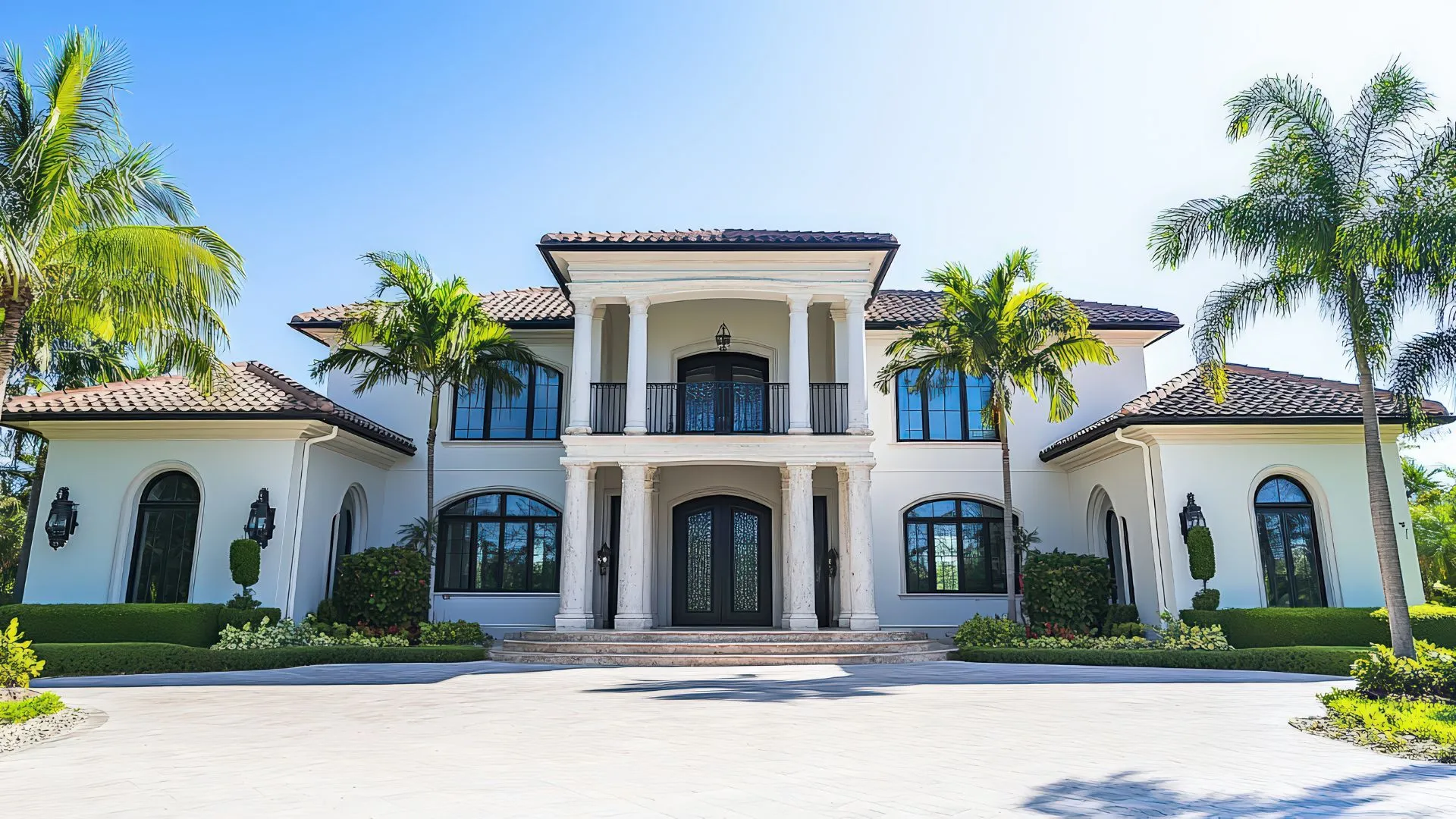 Professional exterior cleaning of a Palm Beach luxury home